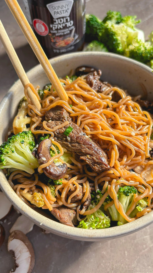 Skinny Noodles Stir-Fried With Mushrooms and Broccoli in Teriyaki Sauce